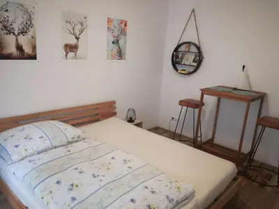Ein Bett oder Betten in einem Zimmer der Unterkunft Steirerhof