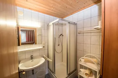 Ein Badezimmer in der Unterkunft Pension Grafengut