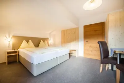 Ein Bett oder Betten in einem Zimmer der Unterkunft Haus Alpenland