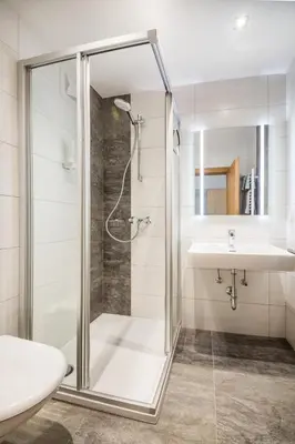 Ein Badezimmer in der Unterkunft Haus Alpenland