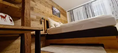 Ein Bett oder Betten in einem Zimmer der Unterkunft Frühstückspension Bachseitenhof