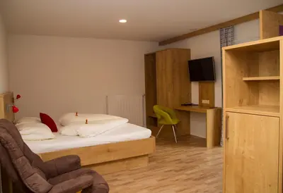 Ein Bett oder Betten in einem Zimmer der Unterkunft Landgasthof Wöhrer