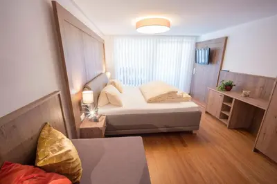 Ein Bett oder Betten in einem Zimmer der Unterkunft Serner am See