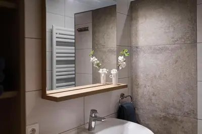 Ein Badezimmer in der Unterkunft Haus Enzian