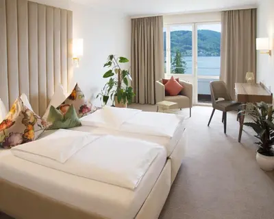 Ein Bett oder Betten in einem Zimmer der Unterkunft Hotel Restaurant Häupl