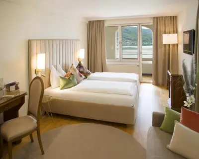 Ein Bett oder Betten in einem Zimmer der Unterkunft Hotel Restaurant Häupl