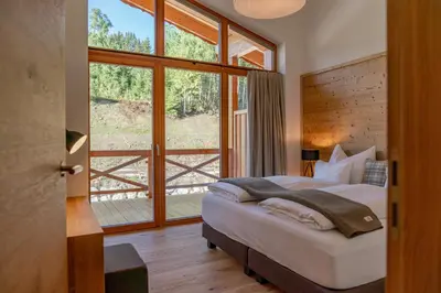Ein Bett oder Betten in einem Zimmer der Unterkunft Skylodge Alpine Homes