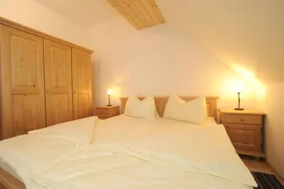 Ein Bett oder Betten in einem Zimmer der Unterkunft Appartementhaus Hochegg