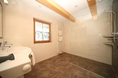 Ein Badezimmer in der Unterkunft Die Postlehen-Alm