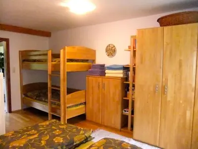 Ein Bett oder Betten in einem Zimmer der Unterkunft Enghagen Haarstube