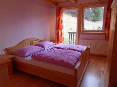 Ein Bett oder Betten in einem Zimmer der Unterkunft Ferienhaus Laberer by Schladmingurlaub