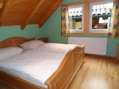 Ein Bett oder Betten in einem Zimmer der Unterkunft Ferienhaus Laberer by Schladmingurlaub