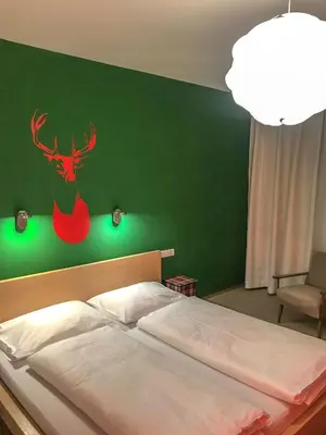 Ein Bett oder Betten in einem Zimmer der Unterkunft Apartmenthaus Rapplhof