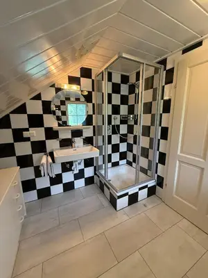 Ein Badezimmer in der Unterkunft Appartements Wieseneck - Ramsau am Dachstein - inklusive Sommercard!