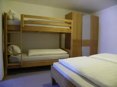 Ein Bett oder Betten in einem Zimmer der Unterkunft Ferienwohnung Ski-Hans