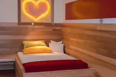 Ein Bett oder Betten in einem Zimmer der Unterkunft PARKVILLA Vital
