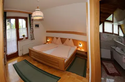 Ein Bett oder Betten in einem Zimmer der Unterkunft Gasthof zur Gams