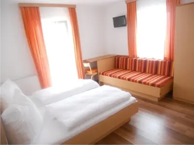 Ein Bett oder Betten in einem Zimmer der Unterkunft Haus Annemarie