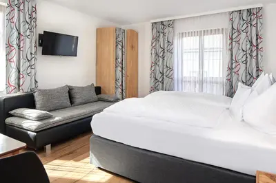 Ein Bett oder Betten in einem Zimmer der Unterkunft Pension Vorberghof- Bauernhofurlaub