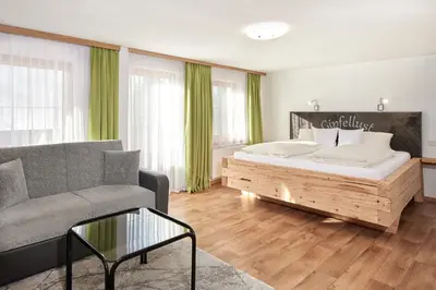 Ein Bett oder Betten in einem Zimmer der Unterkunft Pension Vorberghof- Bauernhofurlaub