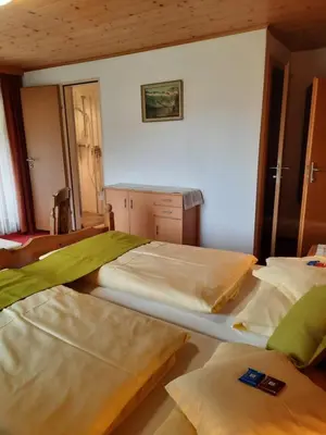 Ein Bett oder Betten in einem Zimmer der Unterkunft Landgasthof Hubertusstubn