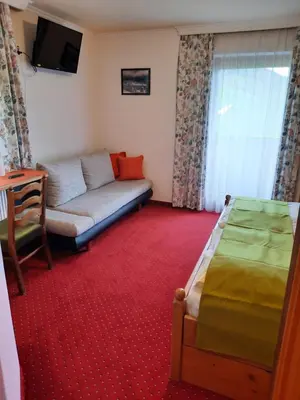 Ein Bett oder Betten in einem Zimmer der Unterkunft Landgasthof Hubertusstubn