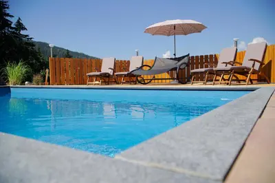 Der Swimmingpool an oder in der Nähe von Apparthaus Taxegger