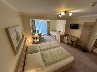 Ein Bett oder Betten in einem Zimmer der Unterkunft Pension Schlömmer