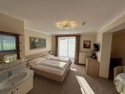 Ein Bett oder Betten in einem Zimmer der Unterkunft Pension Schlömmer