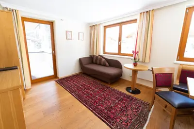 Ein Bett oder Betten in einem Zimmer der Unterkunft Aparthotel Hirschenau