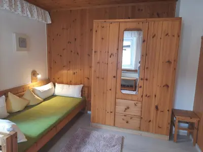Ein Bett oder Betten in einem Zimmer der Unterkunft Haus Grünwald