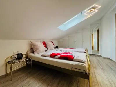 Ein Bett oder Betten in einem Zimmer der Unterkunft Ferienwohnungen Klose