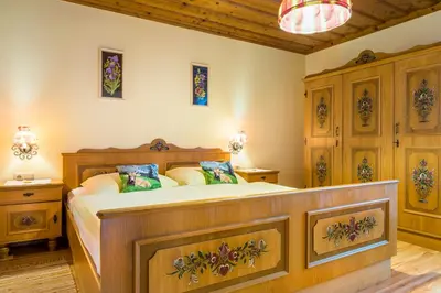 Ein Bett oder Betten in einem Zimmer der Unterkunft Am Ferienbauernhof Schmiedbauer com Salzkammergut