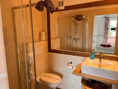 Ein Badezimmer in der Unterkunft Montanara Apartment & Zimmer