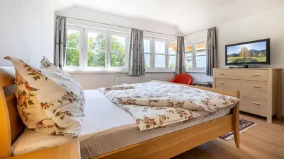 Ein Bett oder Betten in einem Zimmer der Unterkunft Ferienwohnung Neuper