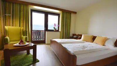 Ein Bett oder Betten in einem Zimmer der Unterkunft Hotel Restaurant Stigenwirth