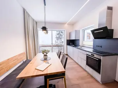 Küche/Küchenzeile in der Unterkunft Glüxplatzl GmbH Appartements am Wald
