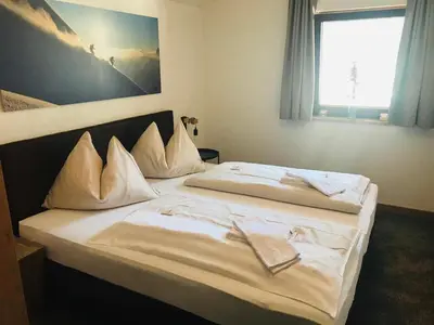 Ein Bett oder Betten in einem Zimmer der Unterkunft Stadlhof