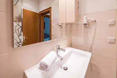 Ein Badezimmer in der Unterkunft Mentenwirt Pension&Appartements