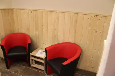Ein Sitzbereich in der Unterkunft Mentenwirt Pension&Appartements