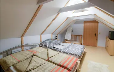 Ein Bett oder Betten in einem Zimmer der Unterkunft Charmantes Ferienhaus