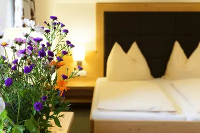 Ein Bett oder Betten in einem Zimmer der Unterkunft Hotel Ennskraxblick