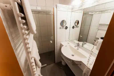 Ein Badezimmer in der Unterkunft Aparthotel Pfeffermühle