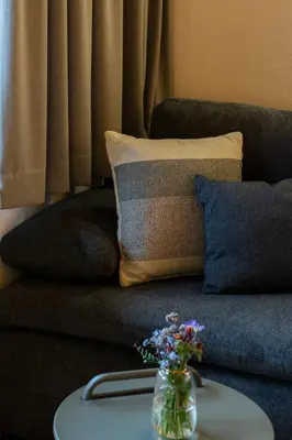Ein Sitzbereich in der Unterkunft Aparthotel Pfeffermühle