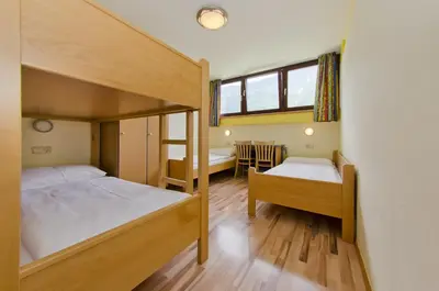 Ein Bett oder Betten in einem Zimmer der Unterkunft Jutel Obertraun
