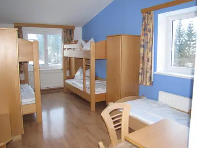 Ein Bett oder Betten in einem Zimmer der Unterkunft Jutel Hinterstoder