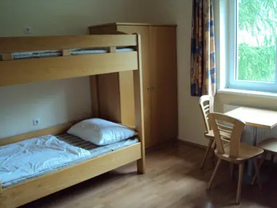 Ein Bett oder Betten in einem Zimmer der Unterkunft Jutel Hinterstoder