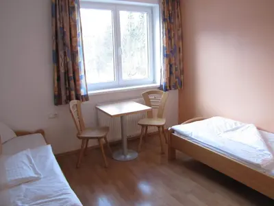 Ein Bett oder Betten in einem Zimmer der Unterkunft Jutel Hinterstoder