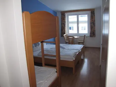 Ein Bett oder Betten in einem Zimmer der Unterkunft Jutel Hinterstoder