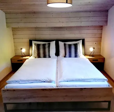 Ein Bett oder Betten in einem Zimmer der Unterkunft Haus Vordertiefenbach